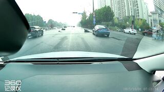 Motorcyclist flung into car trunk after high-speed crash at red light in China