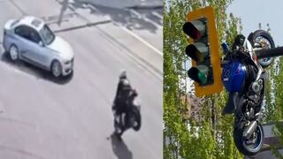 Motorcyclist Seriously Injured After Crash Leaves Bike Dangling From Traffic Light