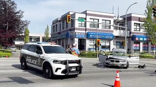 Motorcyclist Seriously Injured After Crash Leaves Bike Dangling From Traffic Light