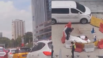 Peron Jumps From A Tall Building In  Kuala Lumpur, on Saturday Afternoon