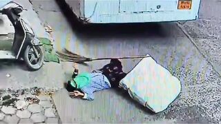 Street Cleaner Injured As A Heavy Parcel Falls From A Bus