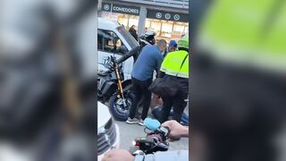 Motorcycle Thief Caught And Beaten In Front of Police