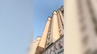 Woman Jumps From A Residental Building In China