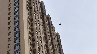 Woman Jumps From A Residental Building In China