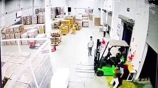A Forklift Driver Crushes Coworker Against Concrete Wall in Reverse