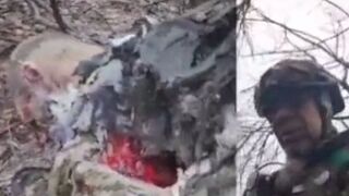 Ukrat films his friend after a zombie attack.