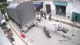 Motorcyclist Dragged Under Truck Wheels in Brutal Accident Caught on Camera