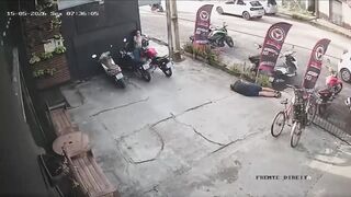 A Hooded Assassin Patiently Waits for His Victim Outside the Gym