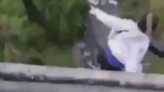 Cellphone Camera  Captures A Moment When Depressed Guy Jumps From The Tall Bridge