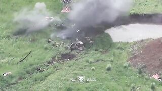 Russian invader running through road decorated with his comrade corpses
