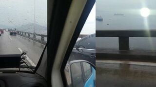 Man Jumps From A Tall Bridge On The Rainy Day