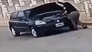 Woman Run Over by Her Own Car After Getting Out to Check the Battery