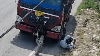 Man, Woman Hit By Truck, Woman Dies Instantly