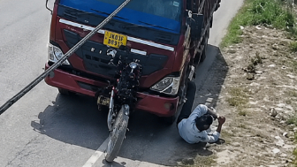 Man, Woman Hit By Truck, Woman Dies Instantly