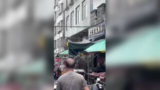 Lunatic Stabs Traffic Cop Before Police Standoff In China