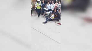 Lunatic Stabs Traffic Cop Before Police Standoff In China