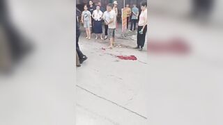 Lunatic Stabs Traffic Cop Before Police Standoff In China