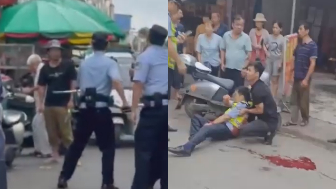 Lunatic Stabs Traffic Cop Before Police Standoff In China