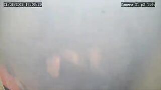 A portable charger explodes inside an elevator, leaving a woman trapped in the flames