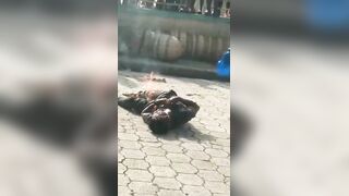 Angry Crowd Burns Thief Alive & Finishes Him with Savage Machete Blows to the Throat