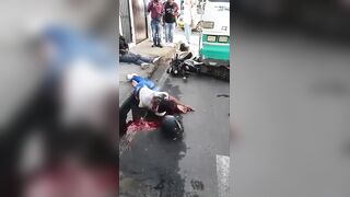 Horrific Collision Between Public Bus and Motorcycle Leaves Two Seriously Injured