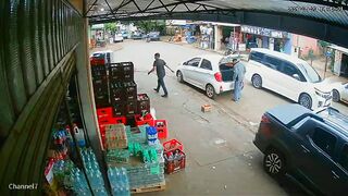 Two Armed Robbers Shot by Police Who Suddenly Appeared During Street Assault