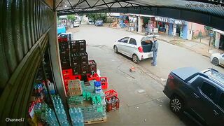 Two Armed Robbers Shot by Police Who Suddenly Appeared During Street Assault