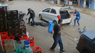 Two Armed Robbers Shot by Police Who Suddenly Appeared During Street Assault