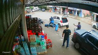 Two Armed Robbers Shot by Police Who Suddenly Appeared During Street Assault