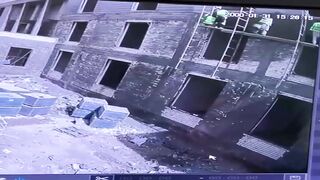 A Tragic Accident in Iraq: Young Workers Fall from High Scaffold