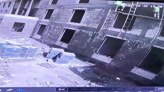 A Tragic Accident in Iraq: Young Workers Fall from High Scaffold