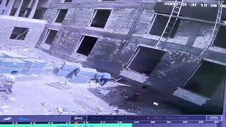 A Tragic Accident in Iraq: Young Workers Fall from High Scaffold