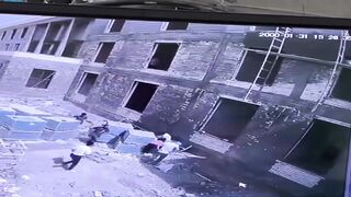 A Tragic Accident in Iraq: Young Workers Fall from High Scaffold