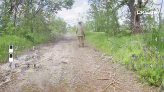 Old russian monkey with a stick against FPV drone
