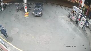 Armed Robbers Open Fire on Employee Who Fought Back at Service Station