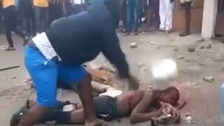 A Bloodthirsty Mob Brutally Finishes Thieves with Massive Rocks After Lynching