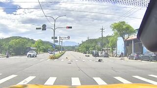 Driver Running On Red Light Sends Rider Flying High