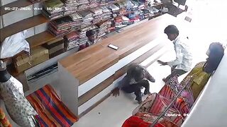 Man Brutally Assaults Girlfriend With Slaps, Punches and Kicks Inside Clothing Store