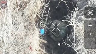 Russian soldier has grenade mishap after an FPV doesnt detonate...