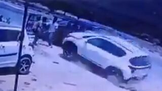 Two Men Standing Near Parked Car Critically Injured By Lost Control Vehicle