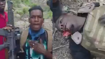 Haitian Gang Members Showing Police Officers They Ambushed And Killed In The Woods