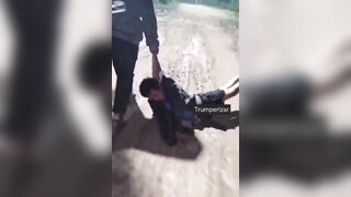 Thief Who Robbed An Old Woman Kicked By Neighbors, Dragged To Police Station