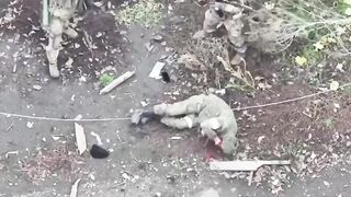 WAR CRIME:Execution of a Russian soldier at point-blank range