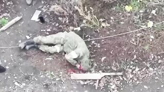 WAR CRIME:Execution of a Russian soldier at point-blank range