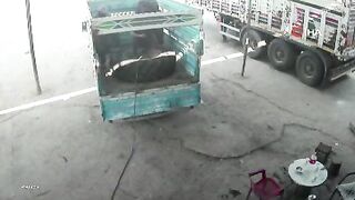 Truck Tire Explodes Like a Bomb, Hurling Two Men Across Workshop