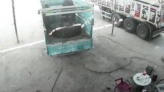 Truck Tire Explodes Like a Bomb, Hurling Two Men Across Workshop