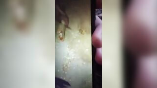 Corpse being dismembered with a machete.