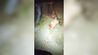 Corpse being dismembered with a machete.