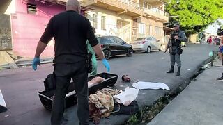 Dismembered corpse in the middle of the street