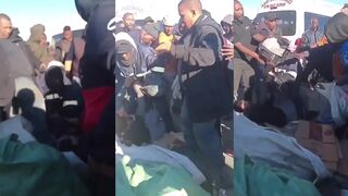 Cellphone Thief Gets Jumped By Taxi Drivers In South Afrca